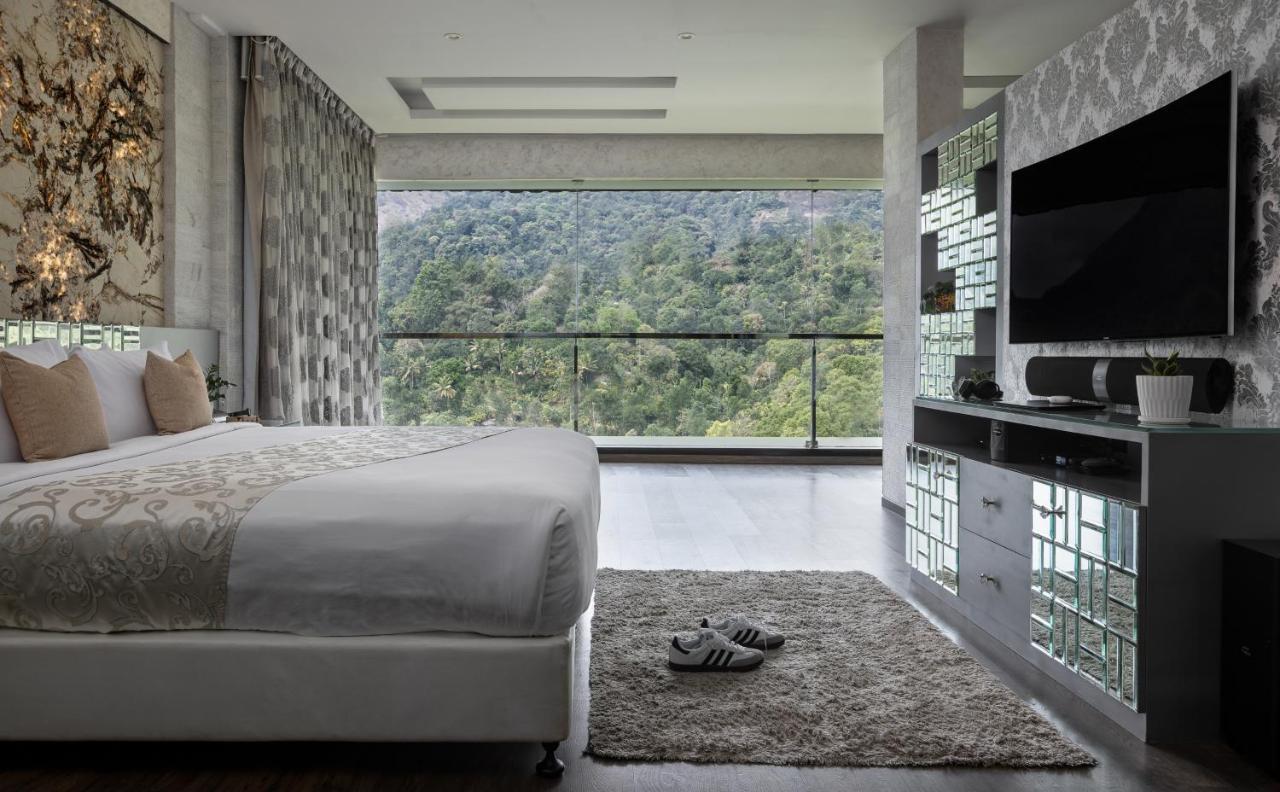 Отель The Panoramic Getaway Муннар Экстерьер фото A bedroom at the hotel